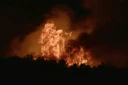 Un feu de forêt à Pouzols-Minervois, le 1er juillet 2026 dans l'Aude ( AFP / Idriss Bigou-Gilles )