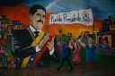 Une fresque murale représentant l'ancien président vénézuélien Nicolas Maduro à Caracas, le 13 mai 2026