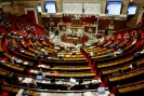 Le ministre de l'Intérieur Gérald Darmanin (c) lors des débats sur le projet de loi immigration à l'Assemblée nationale, le 7 décembre 2023 à Paris