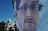 Une image d'Edward Snowden sur une banderole devant le Capitole américain, le 26 octobre 2013 à Washington