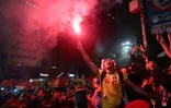 Un partisan du président Luiz Inacio Lula da Silva célèbre l'annonce des résultats du second tour de l'élection présidentielle à Rio de Janeiro, au Brésil, le 25 octobre 2026