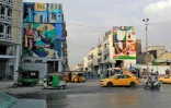 Des fresques peintes sur des murs de Bagdad par l'artiste irakienne Wijdan al-Majed, le 26 avril 2022