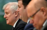 De G à D, les ministres allemands de l'Intérieur Horst Seehofer, du Travail Hubertus Heil et de l'Economie Peter Altmaier donnent une conférence de presse sur un projet de loi sur l'immigration, à Berlin le 19 décembre 2018