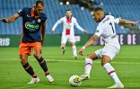 L’attaquant du Paris Saint-Germain, Kylian MbappĂ©, face au dĂ©fenseur brĂ©silien de Montpellier, Vitorino Hilton, lors de la demi-finale de la Coupe de France, le 12 mai 2021 au stade de La Mosson