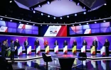 Les onze candidats à l'élection présidentielle sur le plateau de "15 minutes pour convaincre" dans les studios de France 2 à Saint-Cloud, le 20 avril 2017