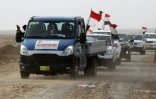 Un convoi apporte de la nourriture aux troupes déployées au sud de Mossoul, en Irak, le 20 octobre 2016