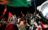 Des manifestants tunisiens agitent des drapeaux palestiniens au port de Sidi Bou Saïd, près de Tunis, le 9 septembre 2025