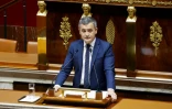 Le ministre de l'Intérieur Gérald Darmanin lors d'un débat sur la loi immigration, le 11 décembre 2023 à l'Assemblée, à Paris