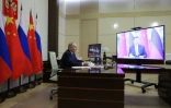 Vladimir Poutine en visioconférence avec son homologue chinois Xi Jinping le 21 janvier 2025
