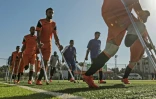 Photo de joueurs d'une équipe palestinienne de football rassemblant des personnes amputées, pour la plupart dans le cadre du conflit avec Israël, prise le 9 juillet 2018 à Deir al Balah, dans la bande de Gaza