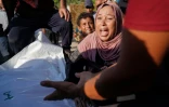 Une Palestinienne pleure après la mort d'un membre de sa famille tué lors d'un bombardement, à l'hôpital Nasser de Khan Younès, dans le sud de la bande de Gaza, le 14 août 2024