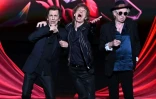 (g-d) Les Rolling Stones Ron Wood, Mick Jagger et Keith Richards sur la scène du Hackney Empire pour le lancement de leur nouvel album "Hackney Diamonds", le 6 septembre 2023 à Londres