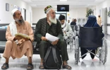 Afghans au centre médical et commercial d'Airitom en Ouzbékistan, le 16 août 2025