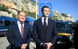 Le président du RN Jordan Bardella (d) et l'ancien patron de l'agence de l'UE Frontex, Fabrice Leggeri, lors d'une visite à un poste frontière entre la France et l'Italie, le 19 février 2024 à Menton, dans les Alpes-Maritimes