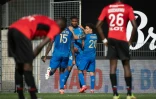 Les Rennais abattus après le 2e but de Reims inscrit par N'dri Philippe Koffi (au centre) au Roazhon Park, le 12 septembre 2021 