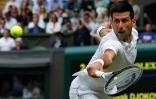 Le Serbe Novak Djokovic contre le Belge David Goffin en quarts de finale de Wimbledon, le 10 juillet 2019