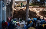 Des migrants sur un bateau des autorités italiennes dans le port de Lampedusa, le 15 septembre 2023