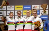 (g à d) Les Danois Lasse Norman Hansen, Julius Johansen, Frederik Rodenberg Madsen et Rasmus Pedersen médaillés d'or de la poursuite par équipes en pulvérisant leur record du monde dans la finale des Mondiaux sur piste de Berlin, le 27 février 2020