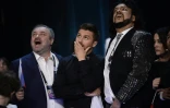 Sergueï Lazarev, représentant de la Russie à l'Eurovision (c) réagit à l'annonce des résultats le 14 mai à Stockholm 