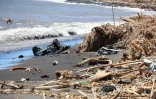 Cyclone Garance voituresdans la mer 