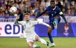 Le Français Ousmane Dembelé (à droite) au duel avec l'Italien Daniel Maldini (à gauche), à l'occasion du match nul entre la France et l'Italie comptant pour la 3e journée de la Ligue des nations, le 2 octobre 2026 à Saint-Denis