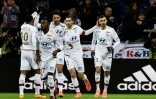 Le milieu lyonnais Rachid Ghezzal (d) fĂŞte son but avec ses camarades face Ă Guingamp, le 6 mars 2016 au Parc OL