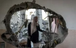 Une femme dans les ruines d'une maison, après un bombardement israélien à Rafah, dans le sud de la bande de Gaza, le 20 avril 2024 ( AFP / - )