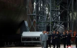 Cette photo non datée transmise le 23 juillet 2019 par l'agence de presse nord-coréenne KCNA montre le leader nord-coréen Kim Jong Un inspecter le chantier d'un nouveau sous-marin, à un endroit non spécifié.