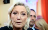 Marine Le Pen, présidente du groupe parlementaire Rassemblement National (RN), s'adresse aux médias après la présentation des vœux de Nouvel An à la presse par Jordan Bardella, à la Maison de l'Amérique latine à Paris, le 12 janvier 2026