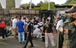 Des policiers et des secouristes sur les lieux d'un accident dans lequel plusieurs dizaines de migrants sont morts, à Tuxtla Gutierrez, dans l'État du Chiapas, au Mexique, le 9 décembre 2021