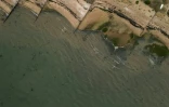 Vue aérienne d'une zone côtière dans laquelle une canalisation d'évacuation des eaux usées active à été signalée, à Whitstable, le 23 juillet 2025 dans le sud-est de l'Angleterre