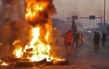 Des manifestants brûlent des pneus à Bagdad le 5 octobre 2019