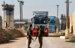 Des camions d'aide humanitaire de retour de Gaza au poste-frontière israélien de Kerem Shalom, le 19 décembre 2023
