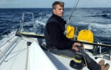 Le skipper français Jean Galfione, à bord de son monocoque Class40 "Serenis Consulting", le 4 octobre 2014 au large de Concarneau, avant de prendre le départ de la Route du Rhum, le 2 novembre depuis Saint-Malo
