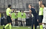 L'entraîneur du PSG Thomas Tuchel en discussion avec l'arbire lors de la victoire à Metz 2-0 le 30 août 2019