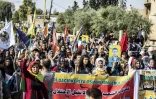 Des Kurdes syriens manifestent contre "l'occupation" turque, dans la ville de Qamichli dans le nor-est de la Syrie, le 23 octobre 2019