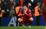 Le défenseur de Liverpool Andy Robertson, dépité après la défaite face à Crystal Palace, le 14 avril 2024 à Anfield
