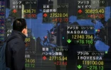 Un tableau d'indices boursiers à Tokyo, le 7 janvier 2021