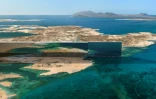 Photo fournie le 26 juillet 2022 par le projet de mégalopole futuriste NEOM montrant le plan de conception des structures parallèles de 500 mètres de haut, connues sous le nom de "The Line", au c&oelig;ur de la ville, sur la mer Rouge