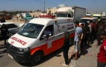 Ambulances transportant les dépuilles des humanitaires étrangers de World Central Kitchen tués dans une frappe israélien