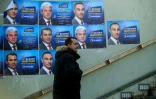 Affiches électorales du parti albanais DUI, collées sur des murs à Skopje, le 10 décembre 2016, à la veille des élections législatives