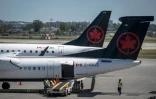 Des avions d'Air Canada sur le tarmac de l'aéroport Pierre-Elliott Trudeau de Montréal (Canada) le 14 août 2025
