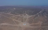 Le monument de l'amitié au point de jonction des frontières de l'Ouzbékistan, du Tadjikistan et du Kirghizistan, vu depuis la région kirghize de Batken, le 20 mai 2025