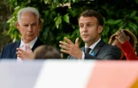 Le ministre chargé des PME Alain Griset au côté d'Emmanuel Macron le 2 juillet 2021 à Paris