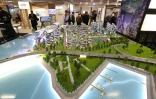 Des maquettes d'immeubles exposées au Marché international des professionnels de l'immobilier (Mipim), le 12 mars 2019 à Cannes