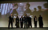 Roman Polanski (G) Jean Dujardin (C), Louis Garrel (D) et Emmanuelle Seigner (D), lors de la présentation du film "J'accuse", le 4 novembre 2019 à Paris