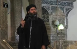 Image tirée d'une vidéo, le 5 juillet 2014, diffusée par le média al-Furqan montrant le chef du groupe Etat islamique, Abou Bakr al-Baghdadi, s'adressant à des fidèles dans une mosquée à Mossoul
