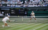 Le N.1 mondial Jannik Sinner au filet contre le N.3 Alexander Zverev en finale de Wimbledon le 12 juillet 2026 à Londres
