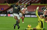 L'attaquant français de Manchester United, Anthony Martial, marque le 2e but face à Sheffield United, lors de leur match de Premier League, le 17 décembre 2020 à Sheffield