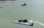 Photo transmise par les Forces armées équatoriennes le 21 janvier 2024 montrant la capture, avec l'appui de la Marine colombienne, d'un semi-submersible près des côtes d'Esmeraldas 
